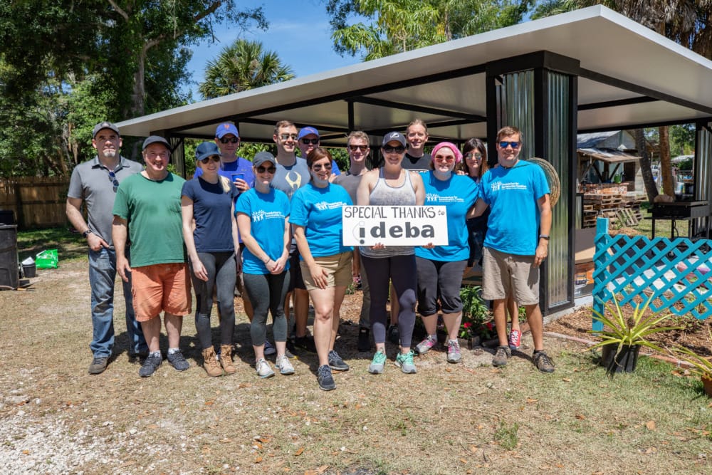 smiling volunteer group