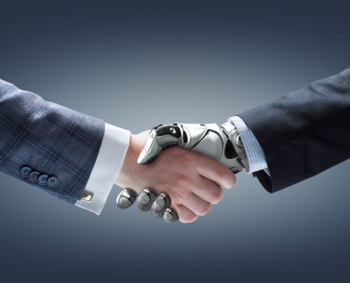 human and robot shaking hands