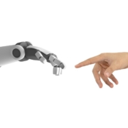 human and robot hands reaching to touch