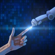 human hand touching robot hand