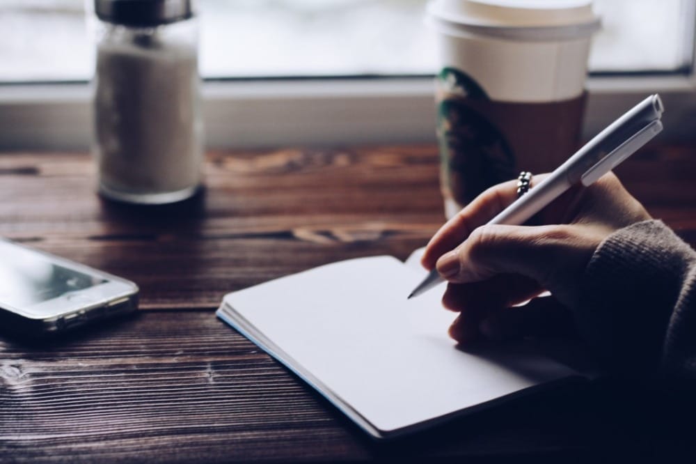 hand writing in journal