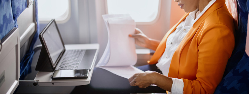 business woman on airplane