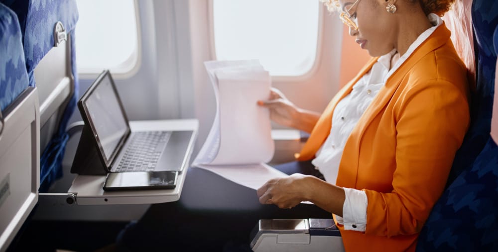 business woman on airplane