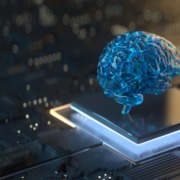 model of brain sitting on cpu