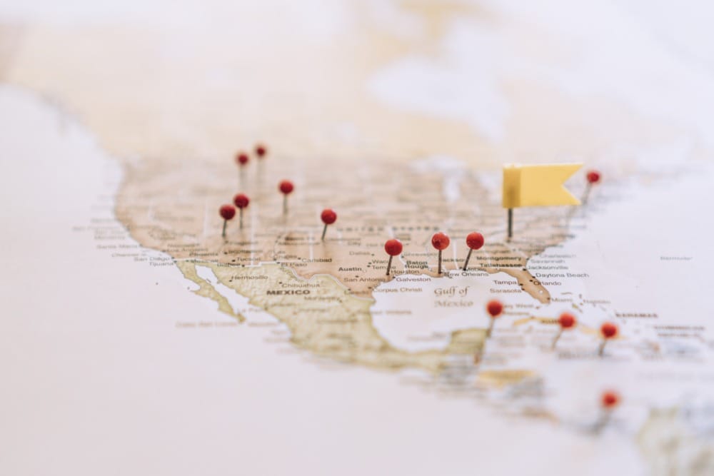 map of united states with red pins in it