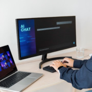 woman working with AI chat on computer