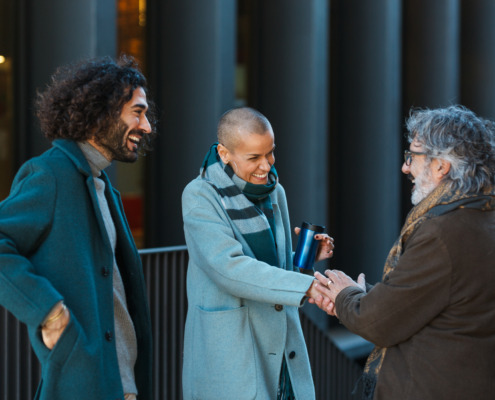 business people talking and meeting on the street