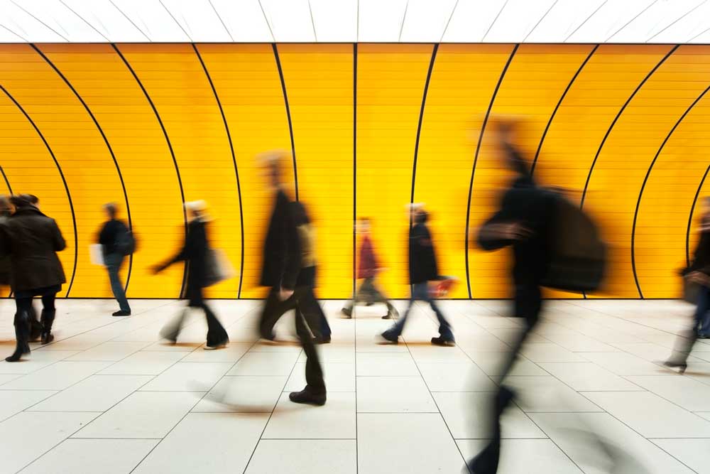 Blurred people walking