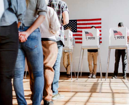 people waiting in line to vote