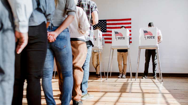 people waiting in line to vote
